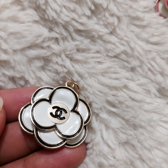 CHANEL Jewelry - CHANEL White and Black Camellia Pendant